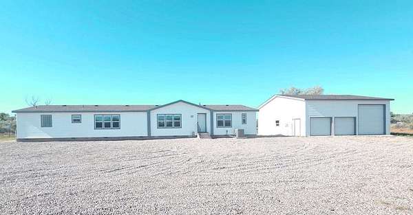 2.5 Acres of Land with Home for Sale in Aztec, New Mexico