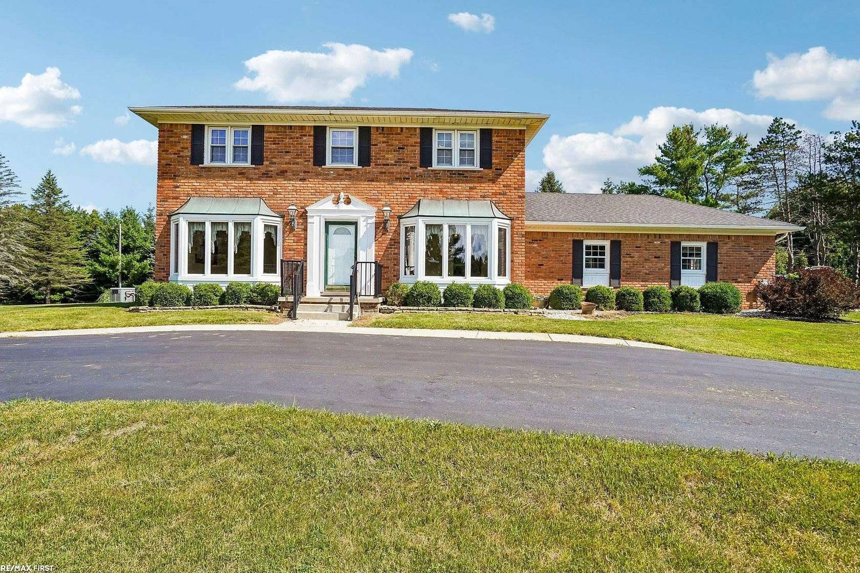 2.27 Acres of Land with Home for Sale in Leonard, Michigan