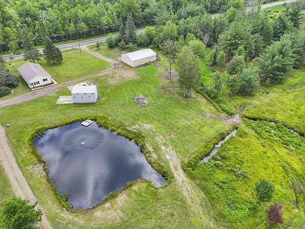 9.25 Acres of Land with Home for Sale in St. Helen, Michigan