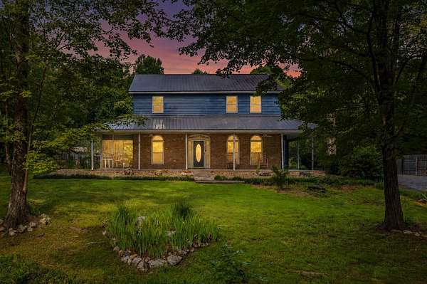 4.86 Acres of Land with Home for Sale in Riceville, Tennessee