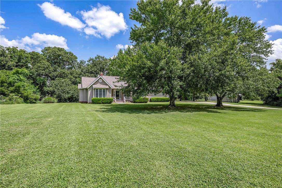 10 Acres of Land with Home for Sale in Siloam Springs, Arkansas
