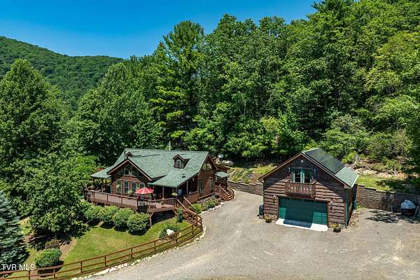 23 Acres of Recreational Land with Home for Sale in Butler, Tennessee