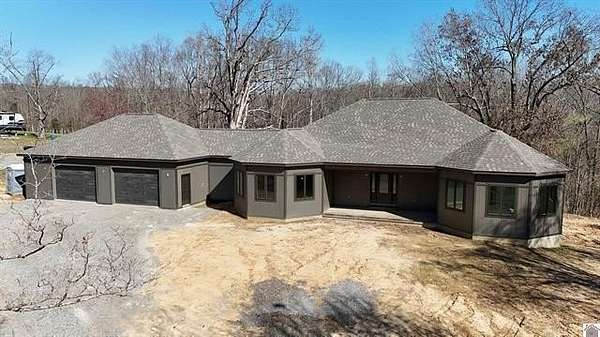 2.12 Acres of Land with Home for Sale in Kuttawa, Kentucky