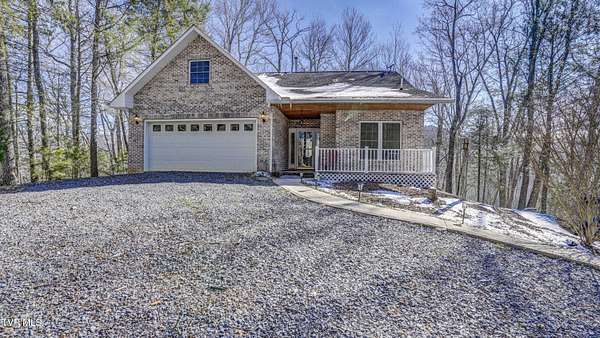 23.2 Acres of Recreational Land with Home for Sale in Roan Mountain, Tennessee