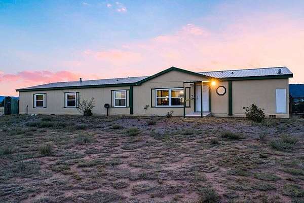 5 Acres of Land with Home for Sale in Edgewood, New Mexico