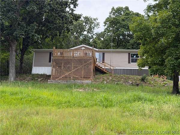 3.8 Acres of Land with Home for Sale in Gravois Mills, Missouri