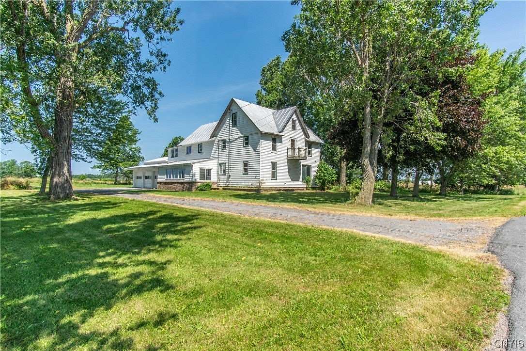 12.6 Acres of Land with Home for Sale in Three Mile Bay, New York