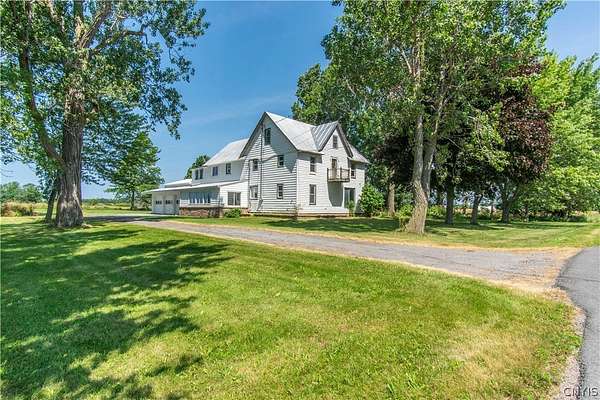 12.6 Acres of Land with Home for Sale in Three Mile Bay, New York