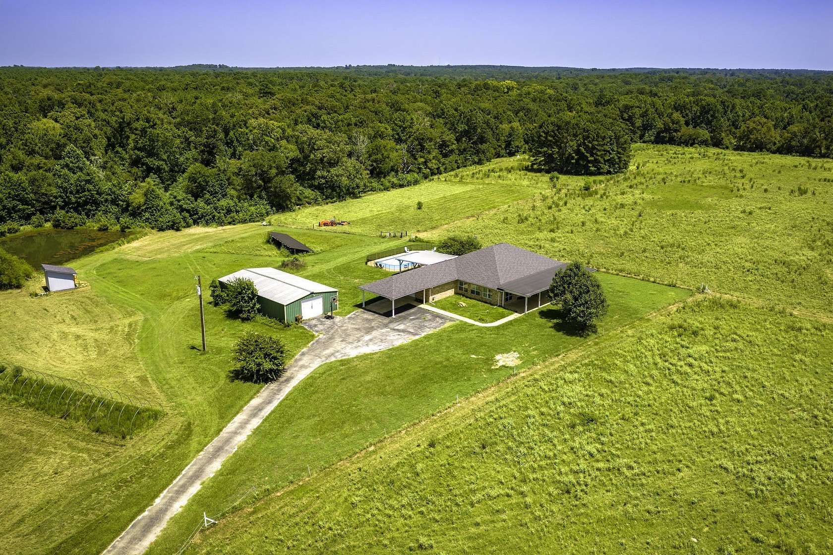 7.46 Acres of Land with Home for Sale in Elkhart, Texas