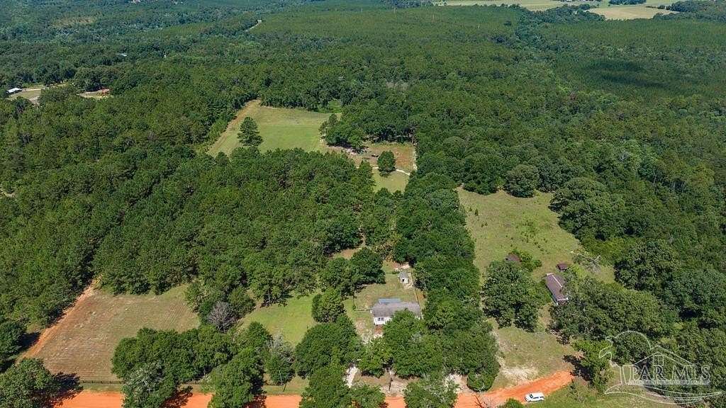 20 Acres of Agricultural Land with Home for Sale in Century, Florida