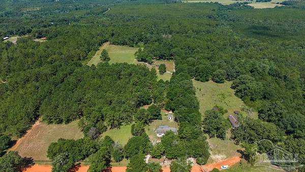 20 Acres of Agricultural Land with Home for Sale in Century, Florida