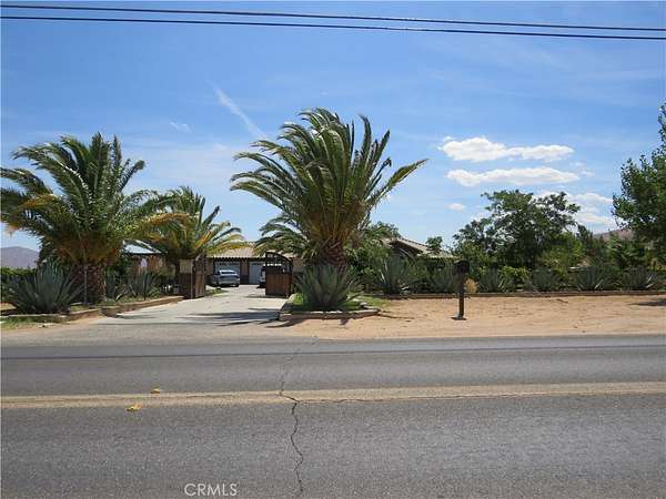 4.32 Acres of Land with Home for Auction in Apple Valley, California
