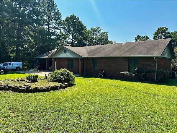 37.6 Acres of Land with Home for Sale in Charleston, Arkansas