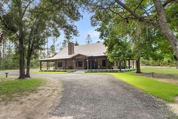 26.7 Acres of Land with Home for Sale in Steinhatchee, Florida
