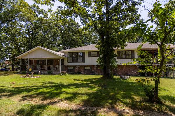 291 Acres of Land with Home for Sale in Rocky Comfort, Missouri