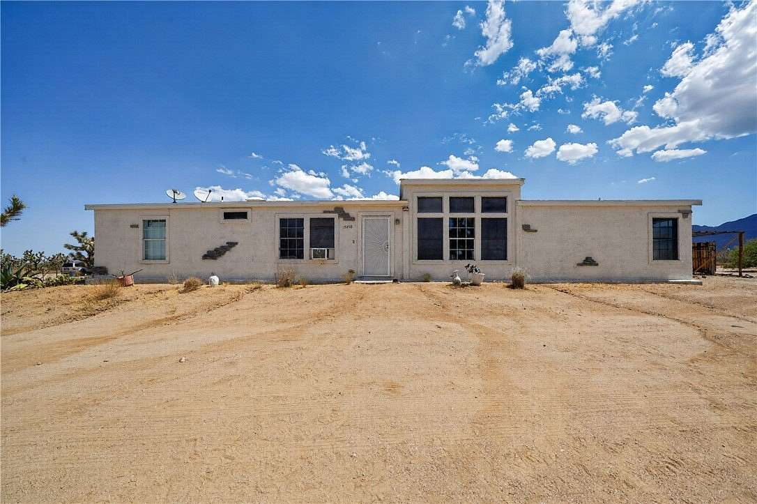 9.89 Acres of Land with Home for Sale in Yucca, Arizona