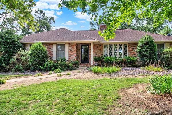 15 Acres of Land with Home for Auction in Ellington, Missouri