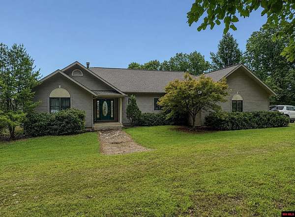 18.5 Acres of Land with Home for Sale in Flippin, Arkansas
