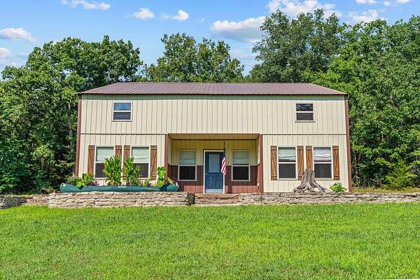 1.74 Acres of Land with Home for Sale in Cedarcreek, Missouri