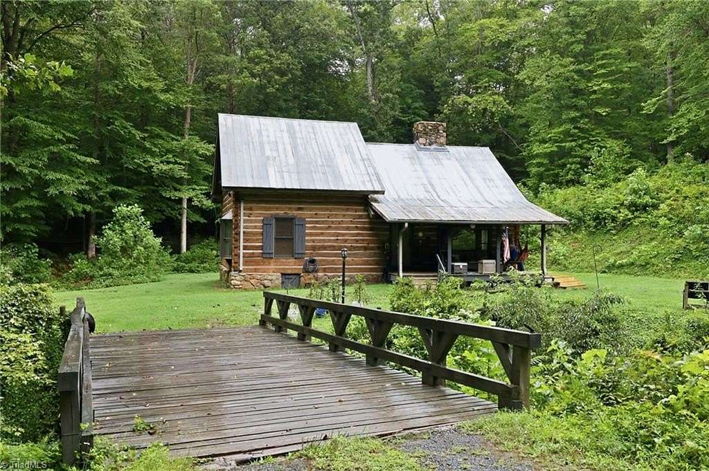 7.82 Acres of Land with Home for Sale in Walnut Cove, North Carolina