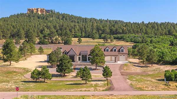 5 Acres of Land with Home for Sale in Palmer Lake, Colorado