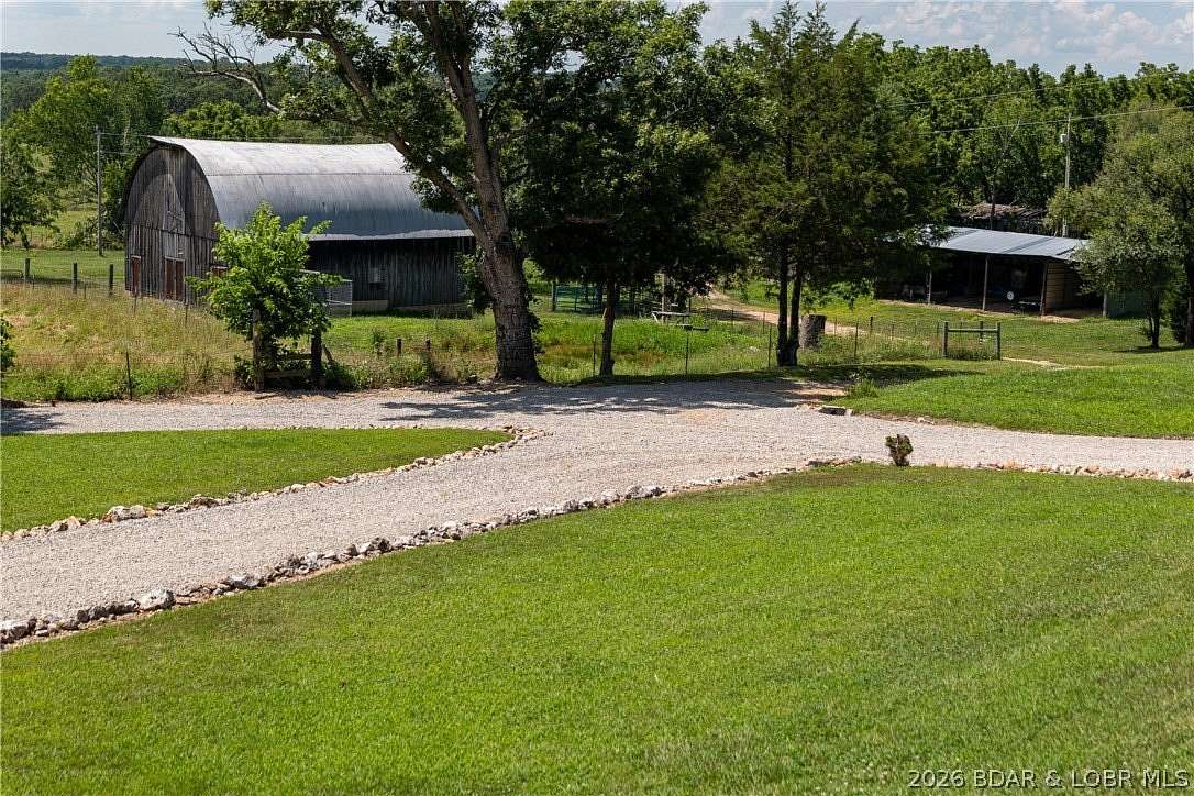 66.3 Acres of Land with Home for Sale in Lebanon, Missouri