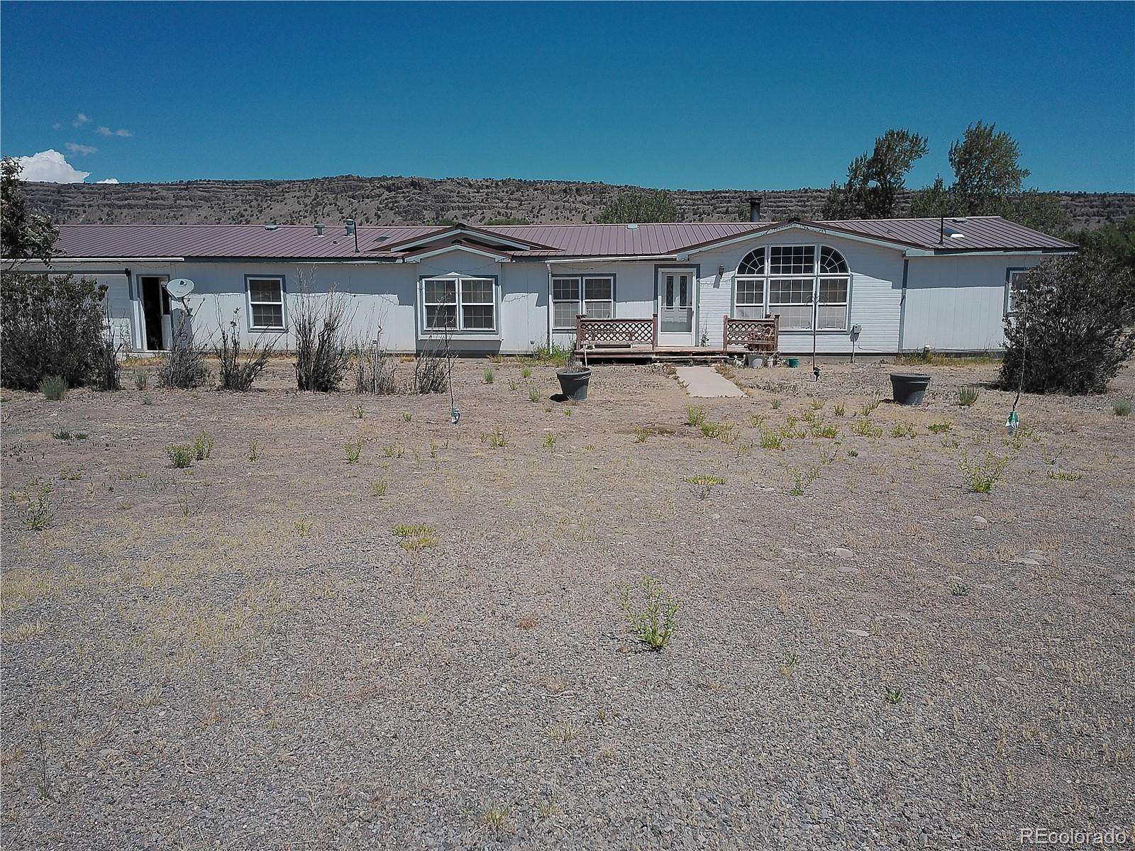 3.47 Acres of Land with Home for Sale in Antonito, Colorado