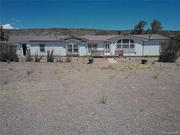 3.47 Acres of Land with Home for Sale in Antonito, Colorado
