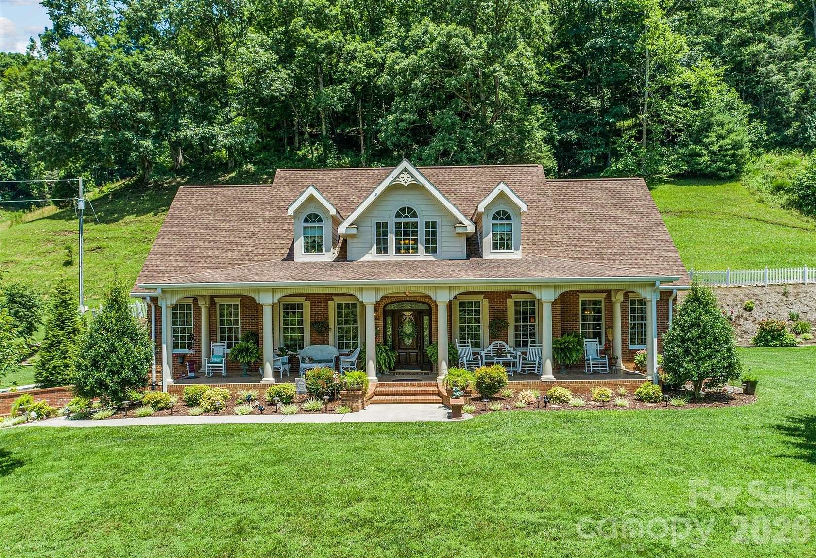 11.1 Acres of Land with Home for Sale in Green Mountain, North Carolina