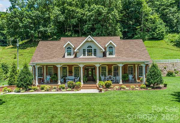 11.1 Acres of Land with Home for Sale in Green Mountain, North Carolina