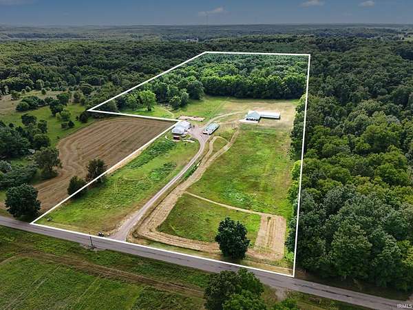 16.6 Acres of Land with Home for Auction in Howe, Indiana