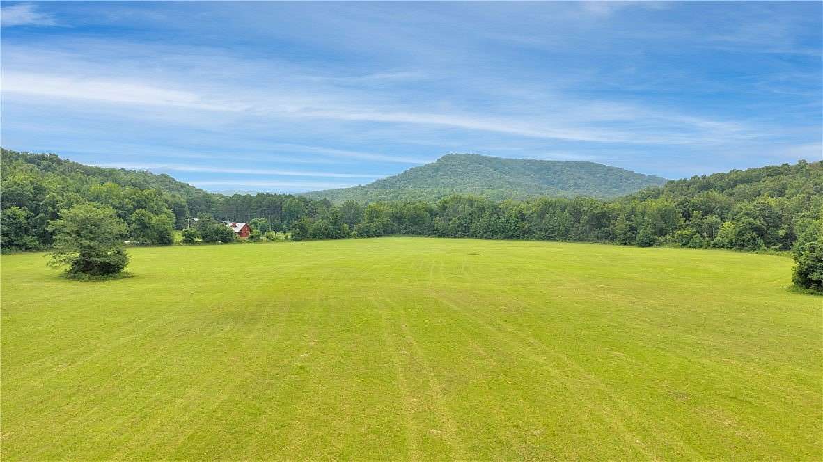 65 Acres of Land with Home for Sale in Combs, Arkansas