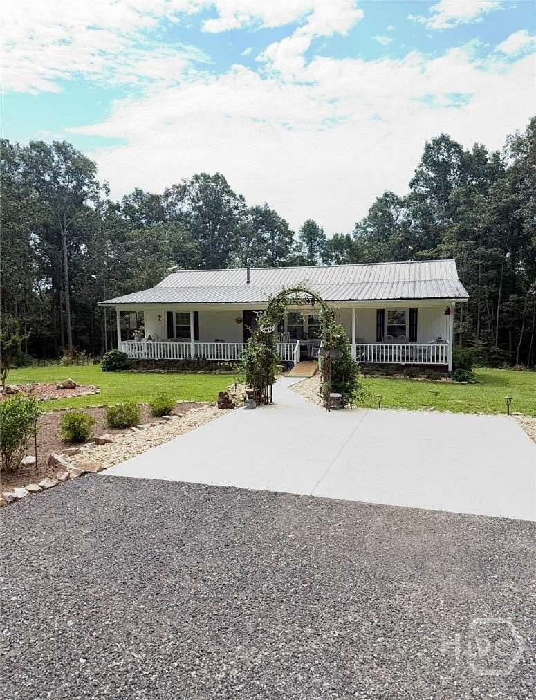 14.2 Acres of Land with Home for Sale in Royston, Georgia