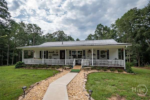 14.2 Acres of Land with Home for Sale in Royston, Georgia