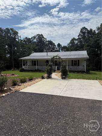 14.2 Acres of Land with Home for Sale in Royston, Georgia