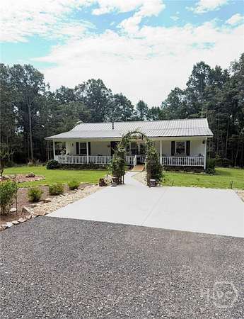 14.2 Acres of Land with Home for Sale in Royston, Georgia