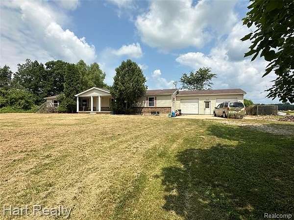 3 Acres of Land with Home for Sale in Lynn Township, Michigan