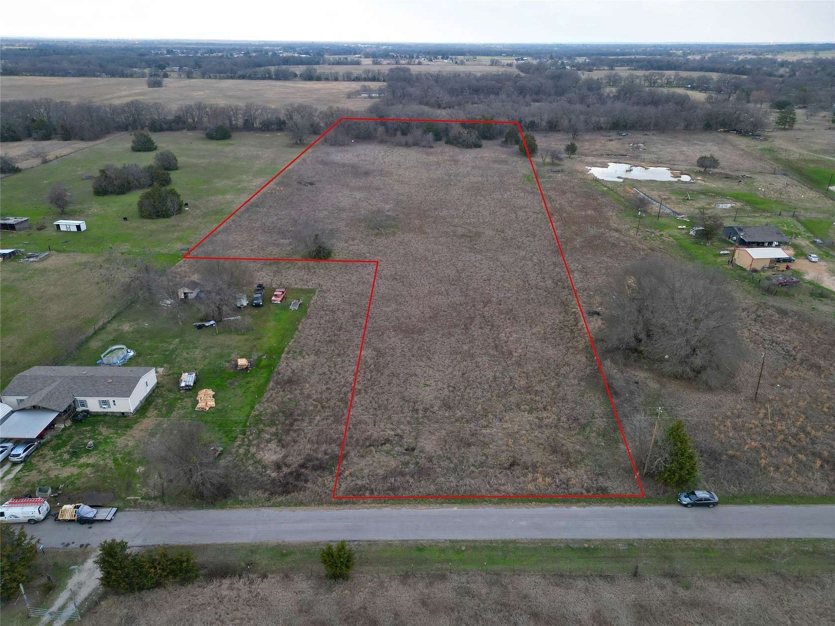 7.4 Acres of Residential Land for Sale in Scurry, Texas