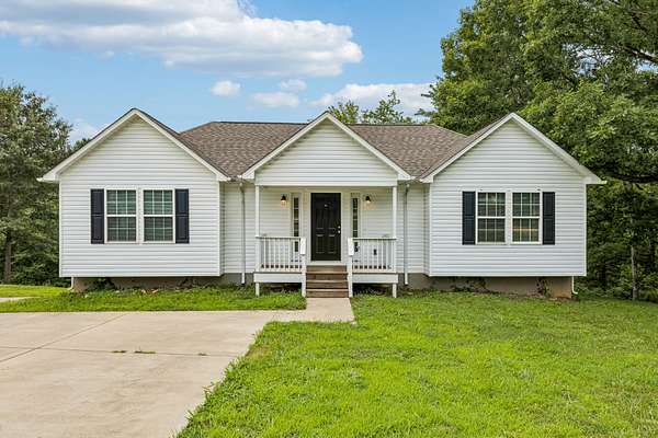 1.69 Acres of Land with Home for Sale in Lawrenceburg, Tennessee