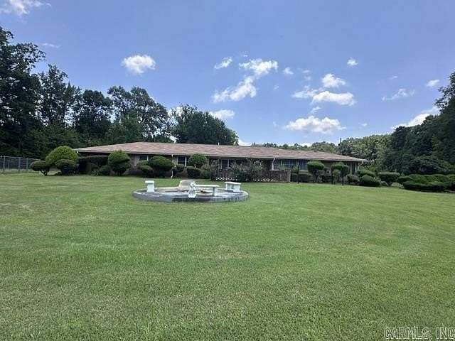 4.73 Acres of Land with Home for Sale in El Dorado, Arkansas