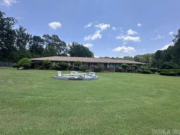 4.73 Acres of Land with Home for Sale in El Dorado, Arkansas