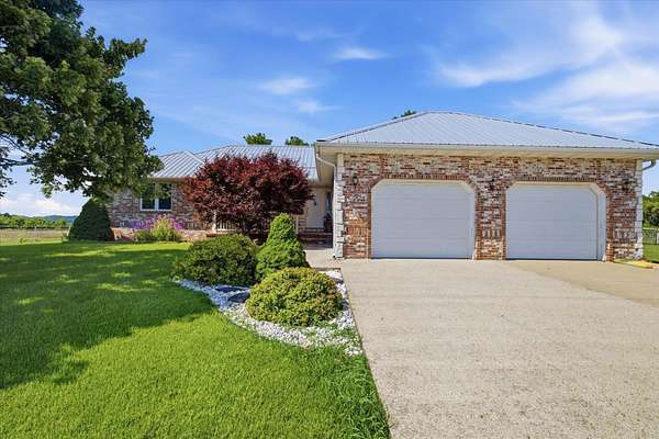 15.7 Acres of Land with Home for Sale in Mansfield, Missouri
