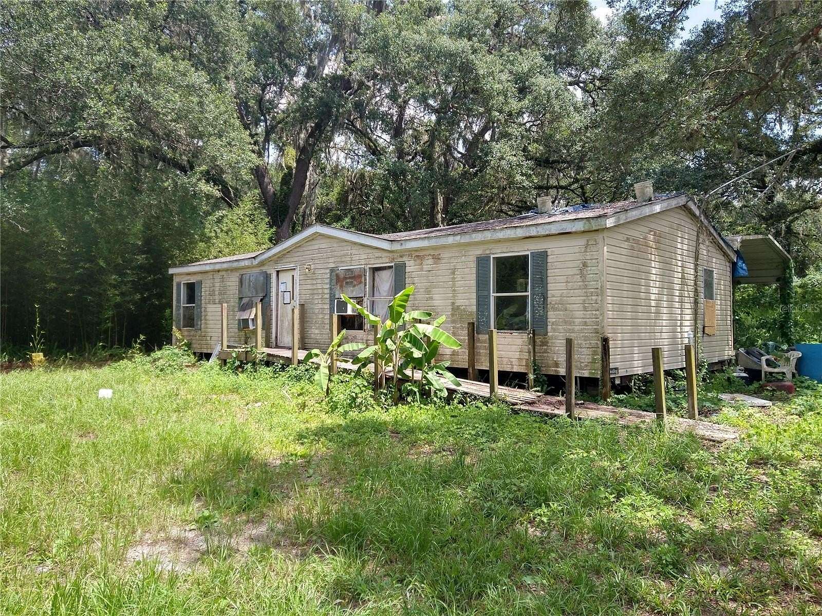 5 Acres of Land with Home for Sale in Hudson, Florida