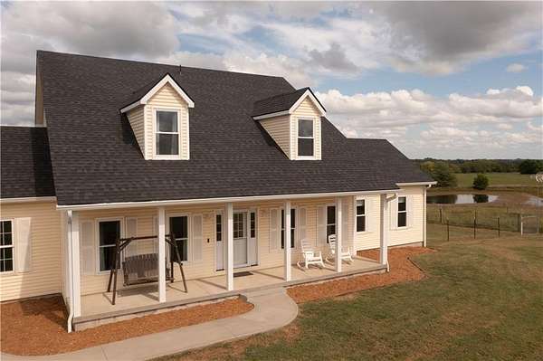 9.5 Acres of Land with Home for Sale in Osborn, Missouri