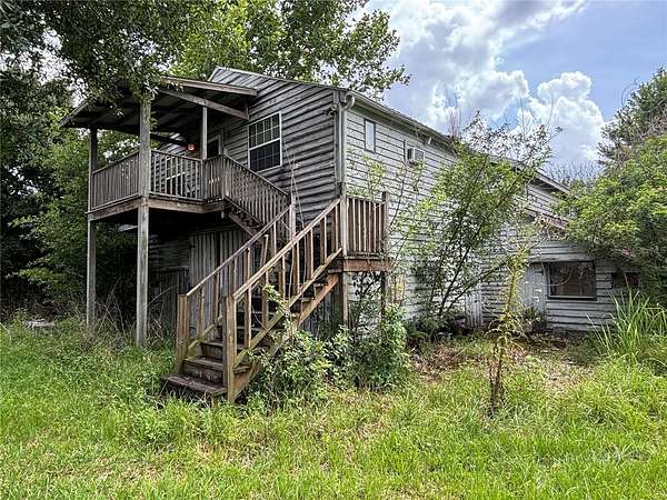 4.85 Acres of Land with Home for Sale in Kissimmee, Florida