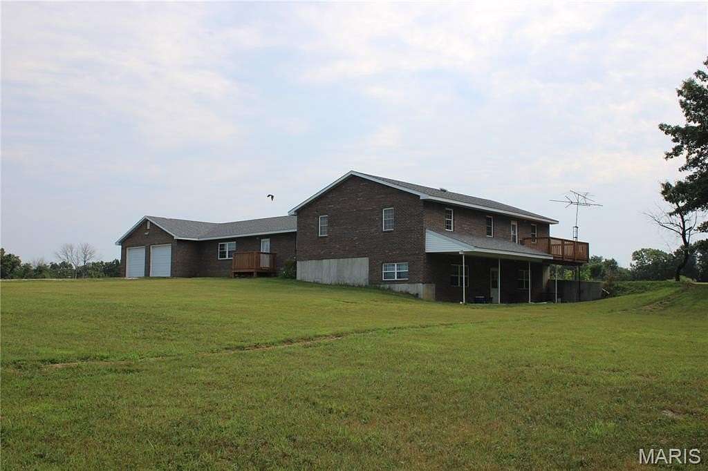 31.7 Acres of Land with Home for Sale in Santa Fe, Missouri