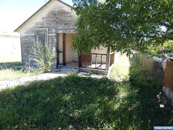 0.51 Acres of Land with Home for Sale in Santa Clara, New Mexico