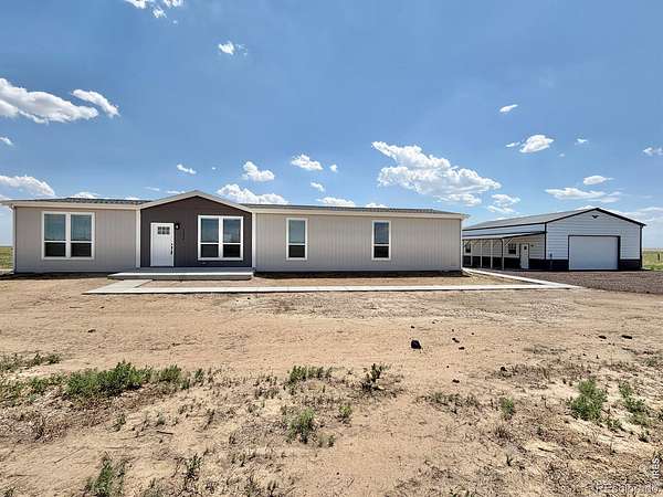 5.62 Acres of Land with Home for Sale in Briggsdale, Colorado