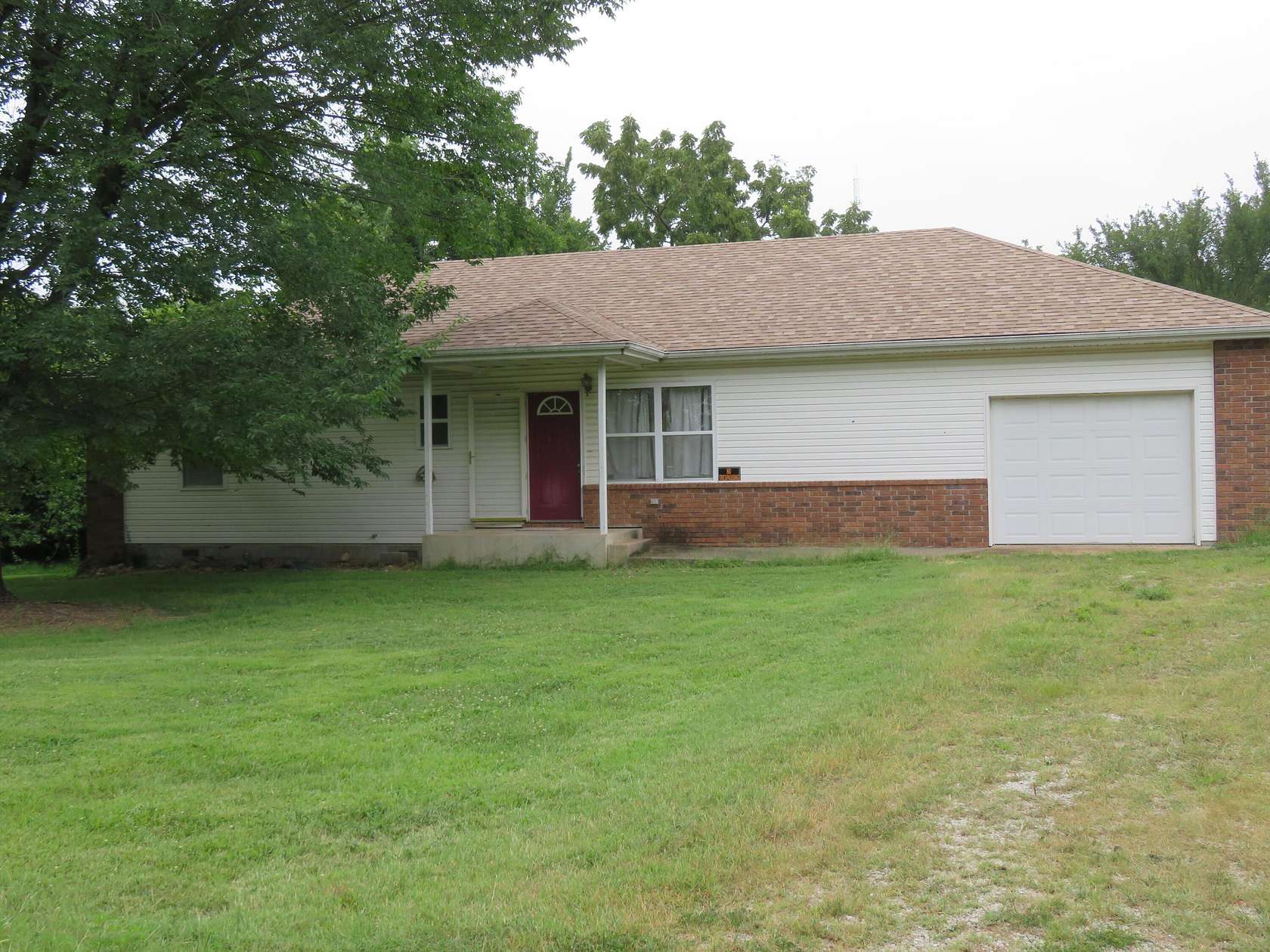 9 Acres of Land with Home for Sale in Humansville, Missouri