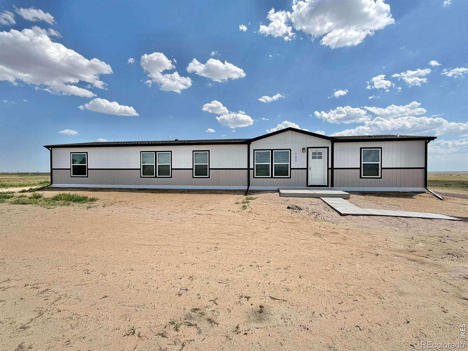 8.23 Acres of Land with Home for Sale in Briggsdale, Colorado